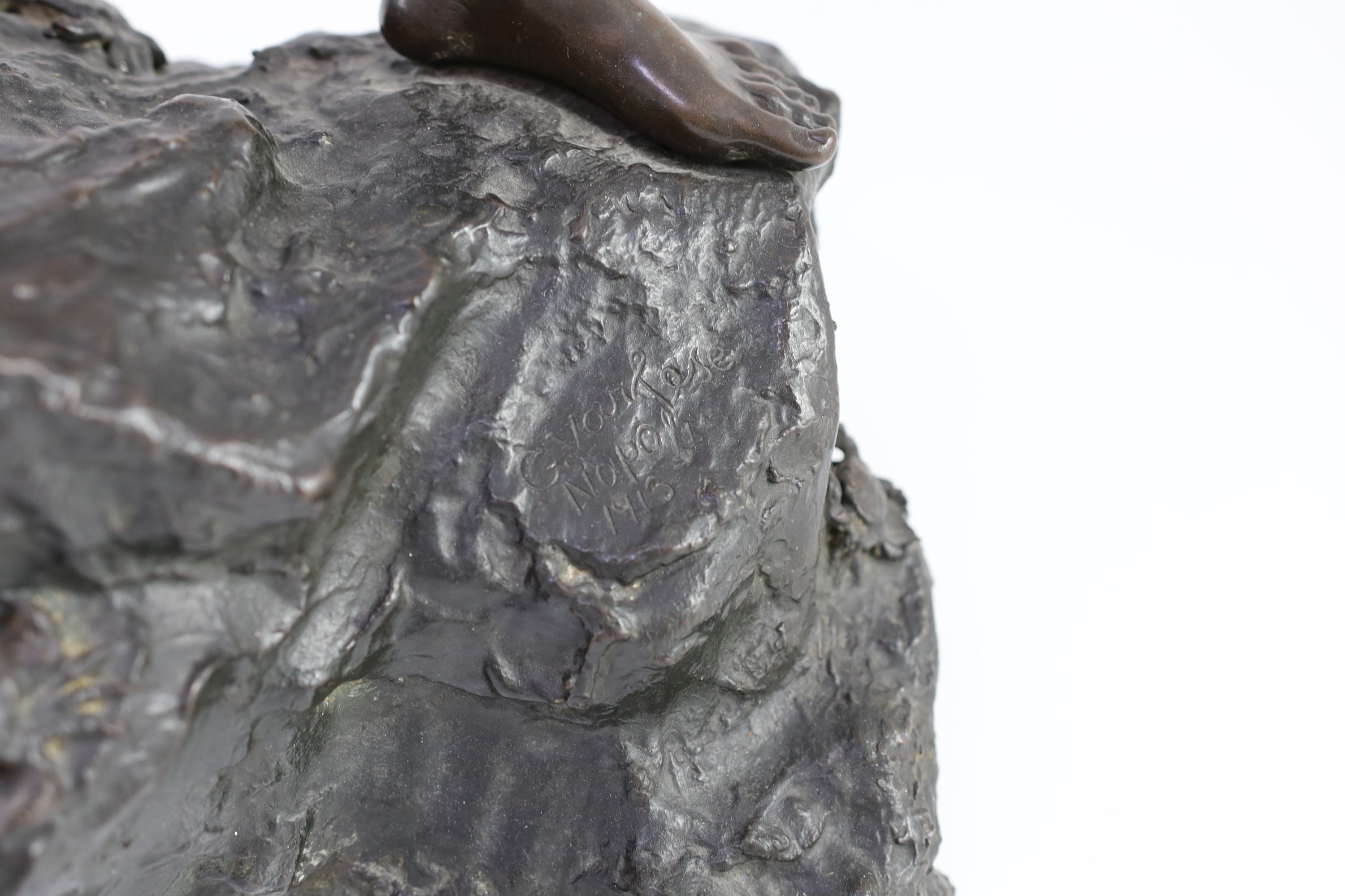 Giovanni Varlese (Italian, 1888-1922). A bronze figure of a fisherboy standing holding a fish to his chest, height 72cm